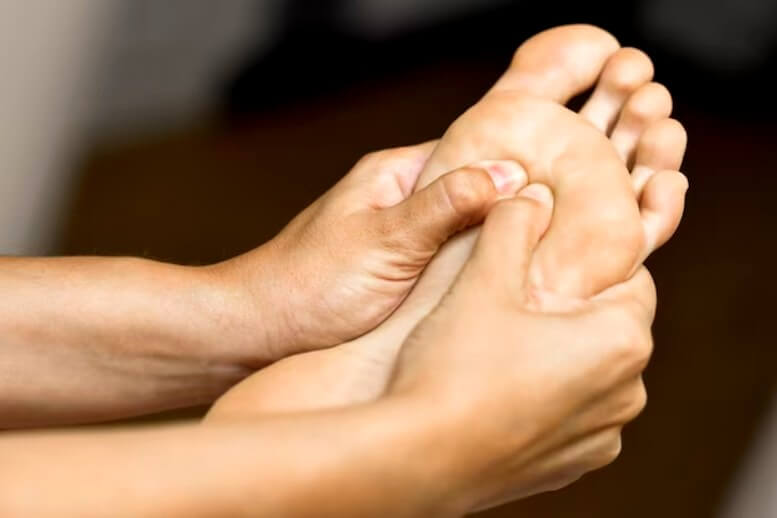 Massage pied homme